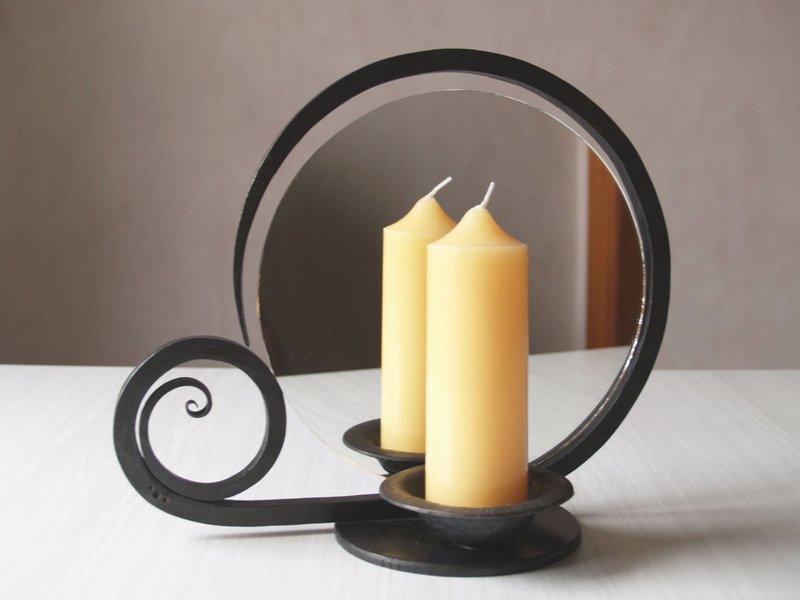 Žvakė ir sąmokslo veidrodis