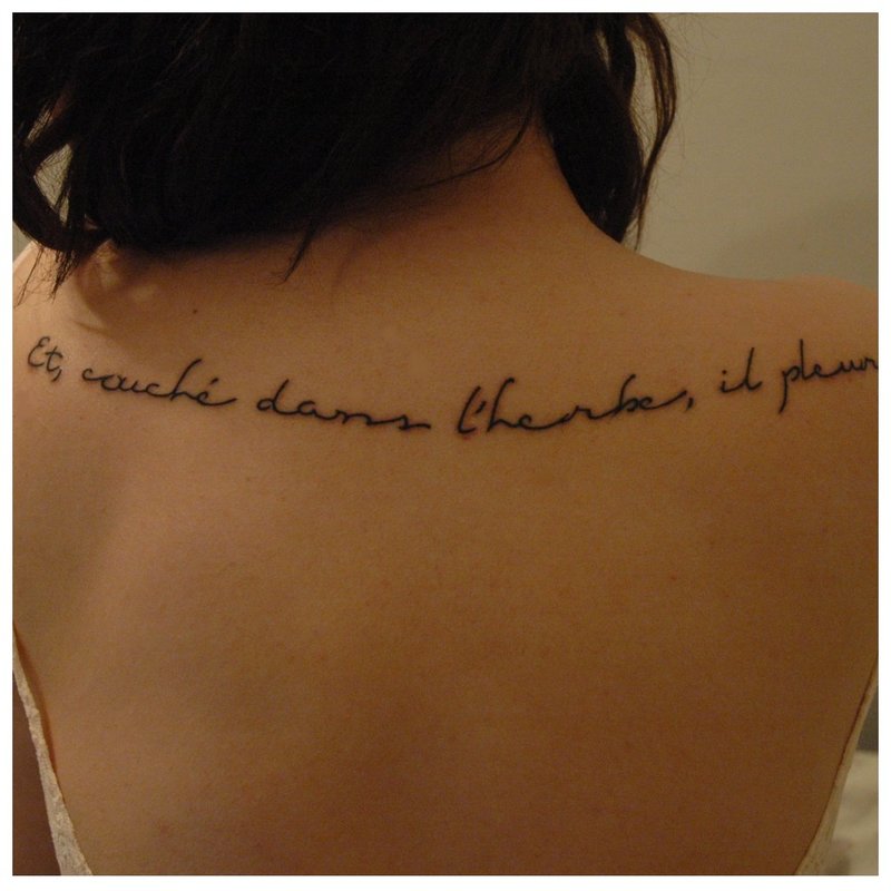 Tatuaż z francuskim napisem