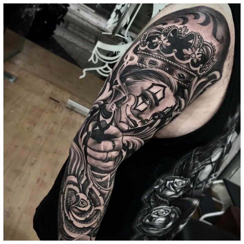 Chicano-tatoeage op de arm