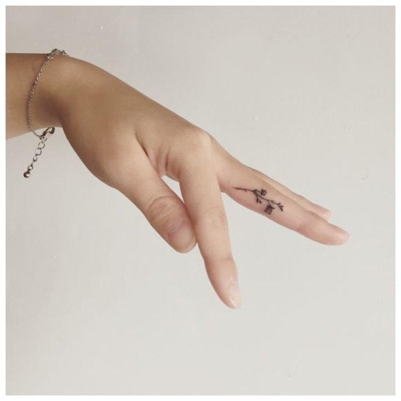 Tatuaj cu degetul