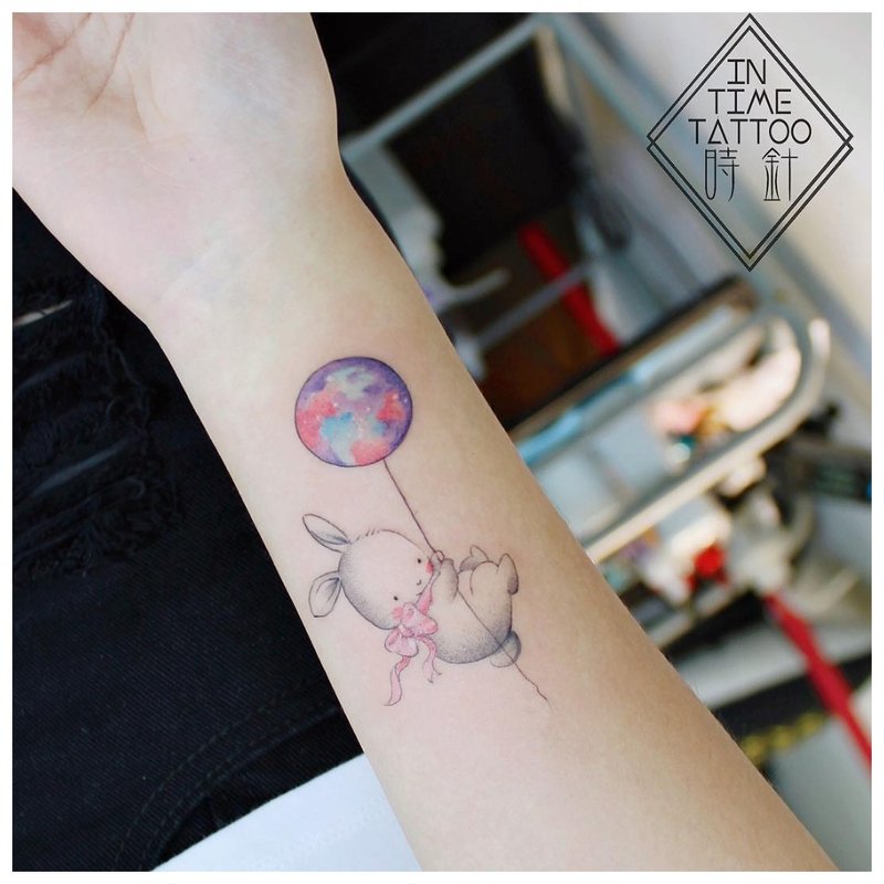 Állati csukló tetoválás