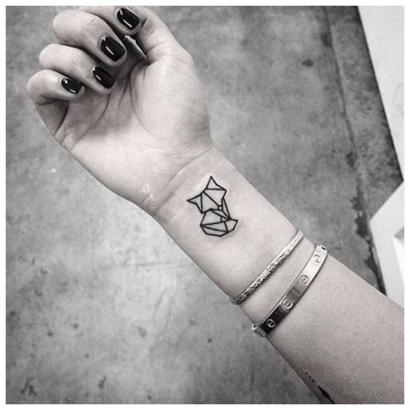 Gyvūno tatuiruotė ant rankos