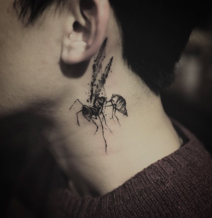 Beautiful and original tattoo on the neck