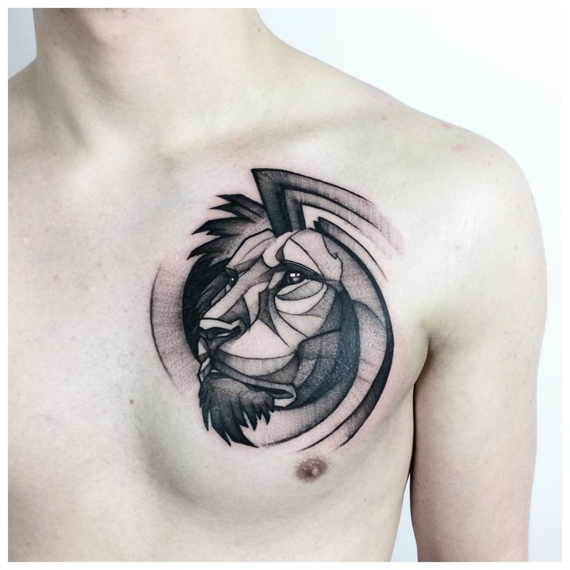 Klok løve - tatovering på brystet til en mann
