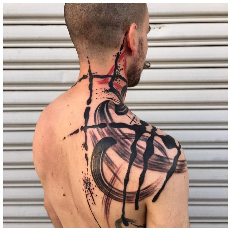 Bright tattoo on the back and neck of a man