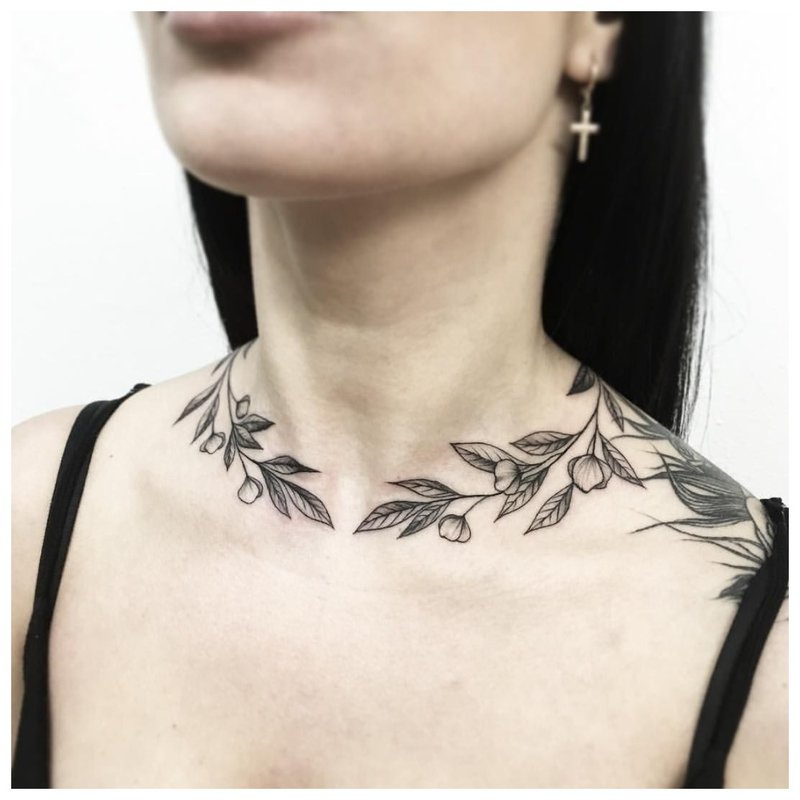 Tattoo on the girl's neck