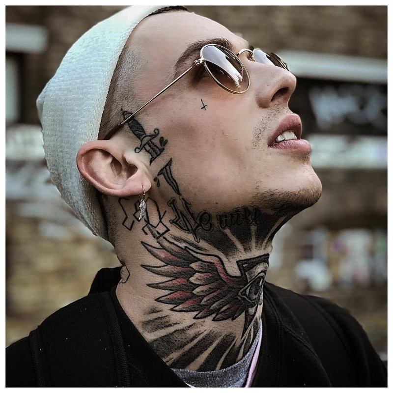 Tattoo on the throat of a man