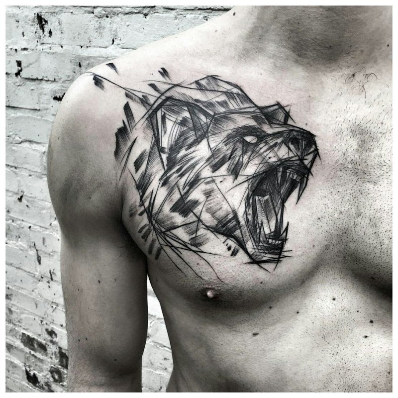 Animal - tatuaj pe pieptul unui bărbat
