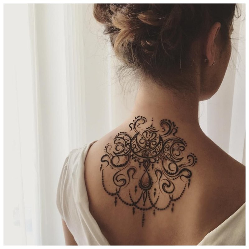 Mehendi Tattoo On The Back