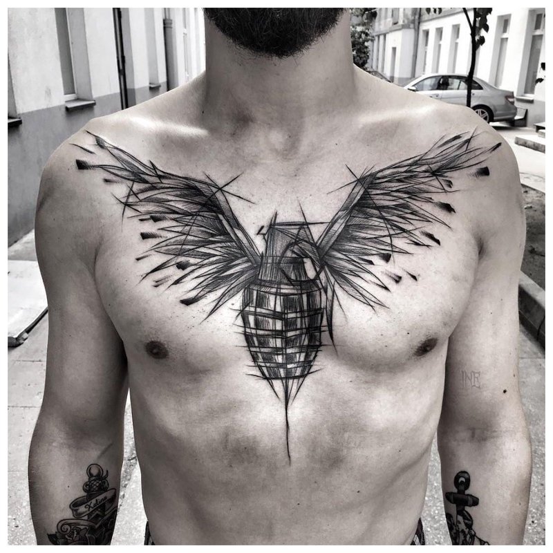 Vogel - tattoo op de borst van een man